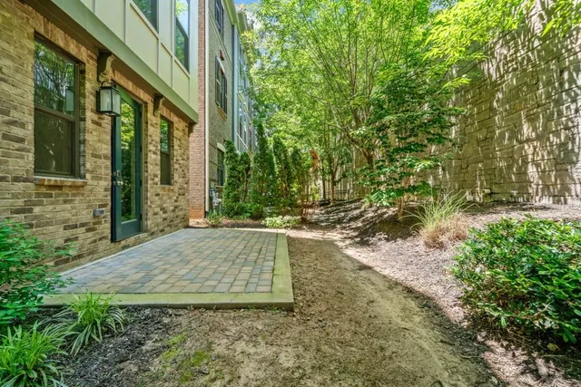 a view of backyard with green space