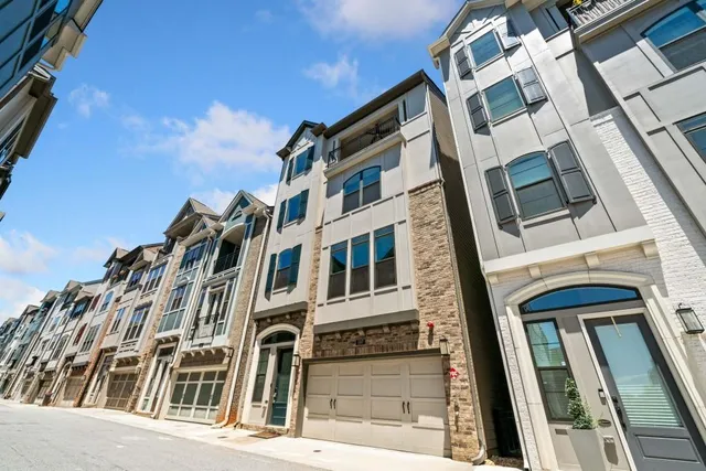 a view of a building with a street