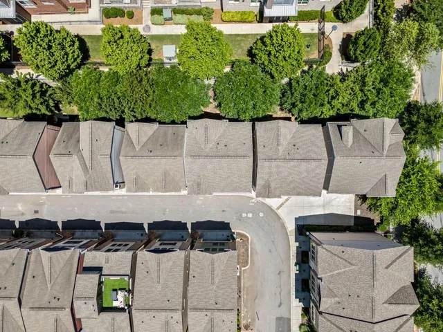 a aerial view of a chairs and table on the patio