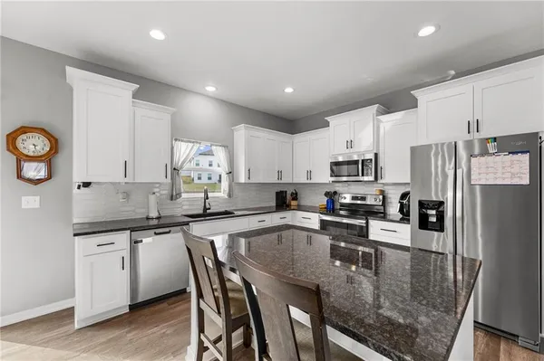 $410,000 | 11722 North Manning Avenue, Kansas City, MO 64157