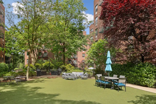 a bathroom with a sink toilet a mirror and shower