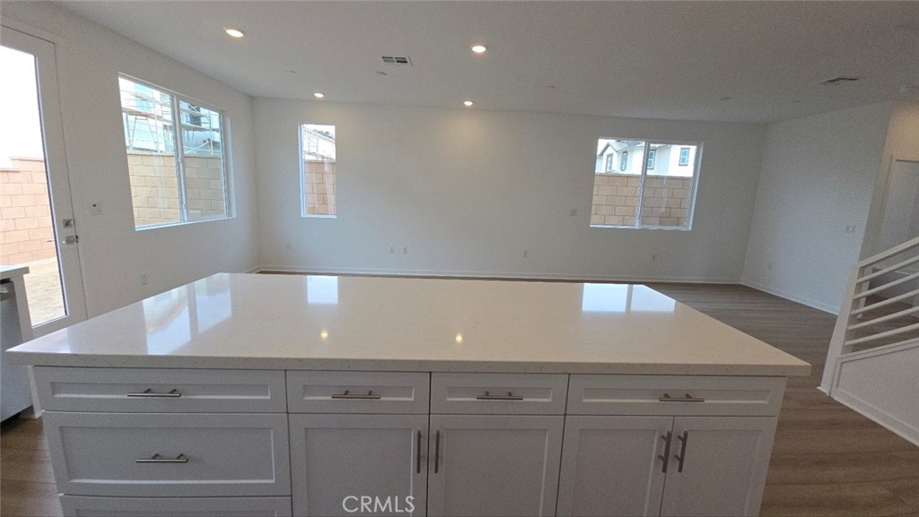 3256 Sprout Paseo Ontario, CA 91761 - Photo 11 of 44 a view of an empty room with windows