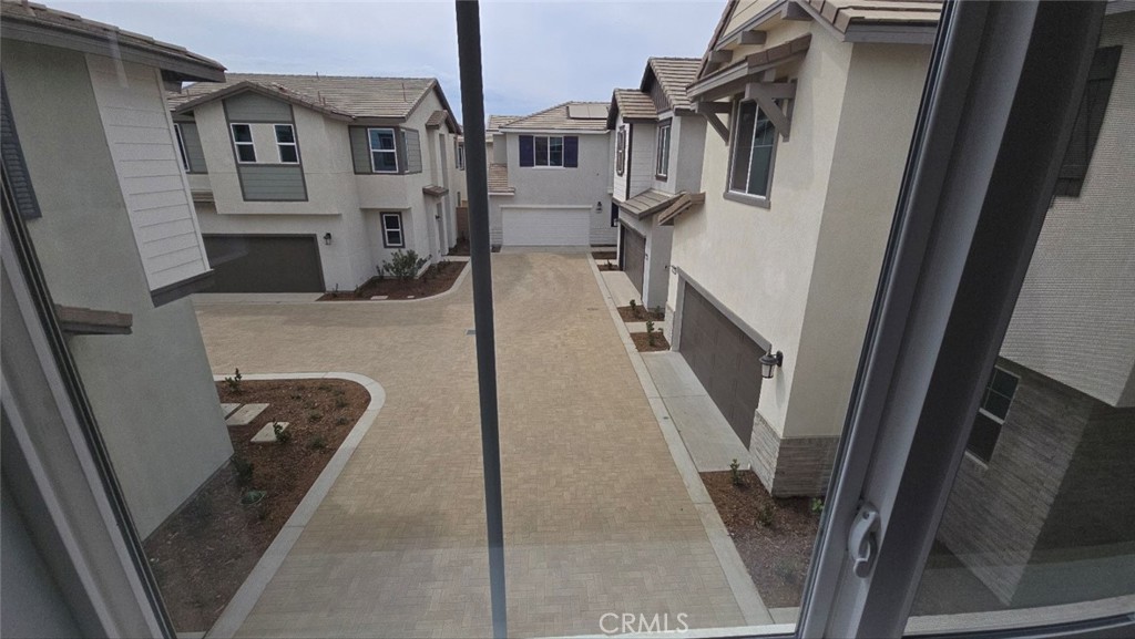 3256 Sprout Paseo Ontario, CA 91761 - Photo 30 of 44 a view of living room with furniture and a fireplace