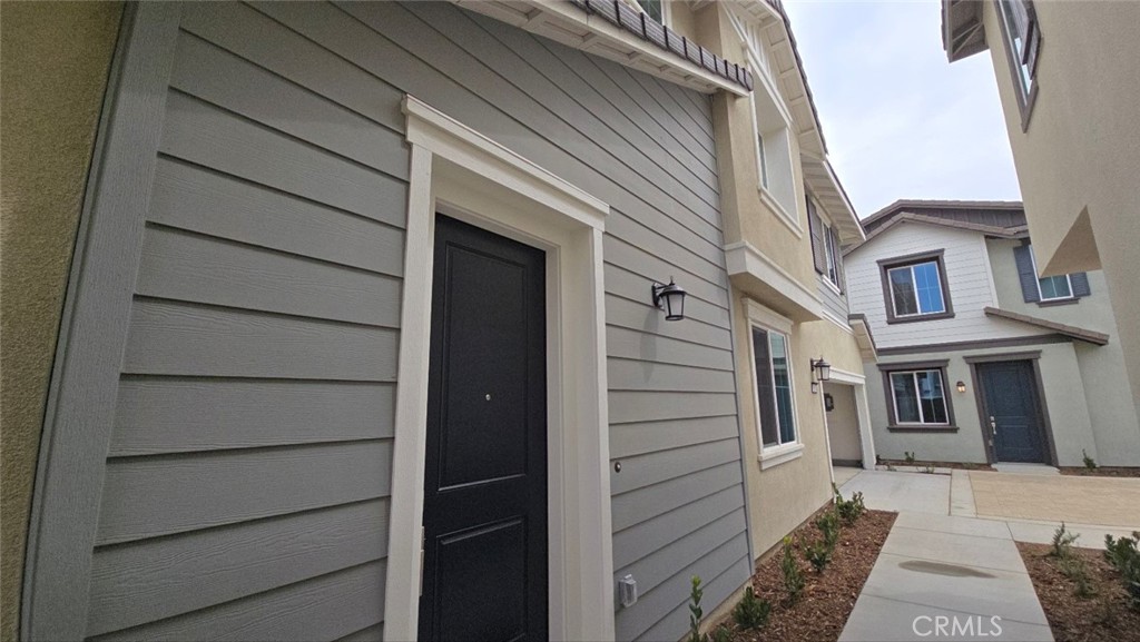 3256 Sprout Paseo Ontario, CA 91761 - Photo 39 of 44 a view of a house with a door