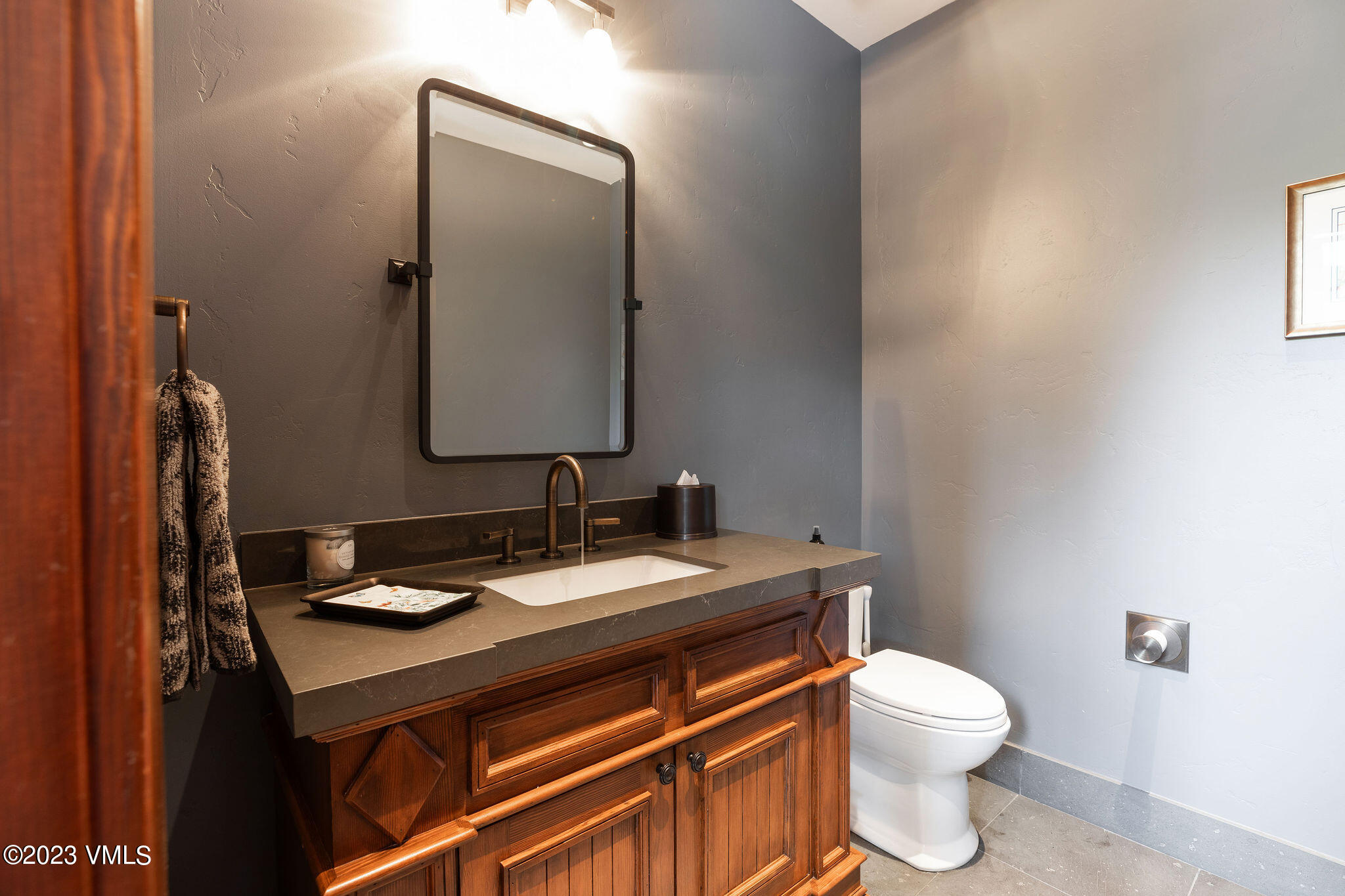 520 Old Creamery Road Edwards, CO 81632 - Photo 21 of 78 a bathroom with a sink vanity mirror and toilet