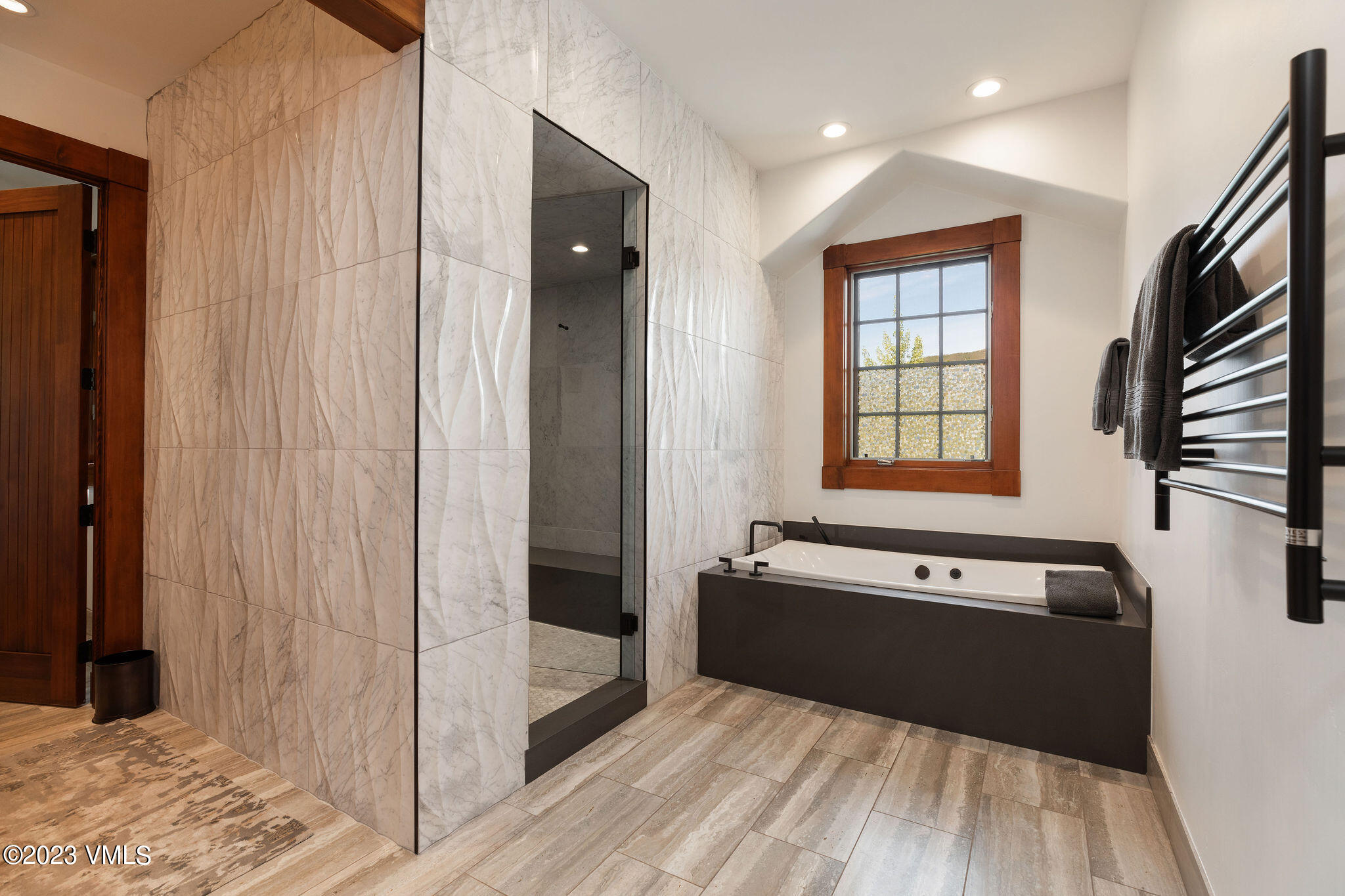 520 Old Creamery Road Edwards, CO 81632 - Photo 24 of 78 a spacious bathroom with a bathtub and shower