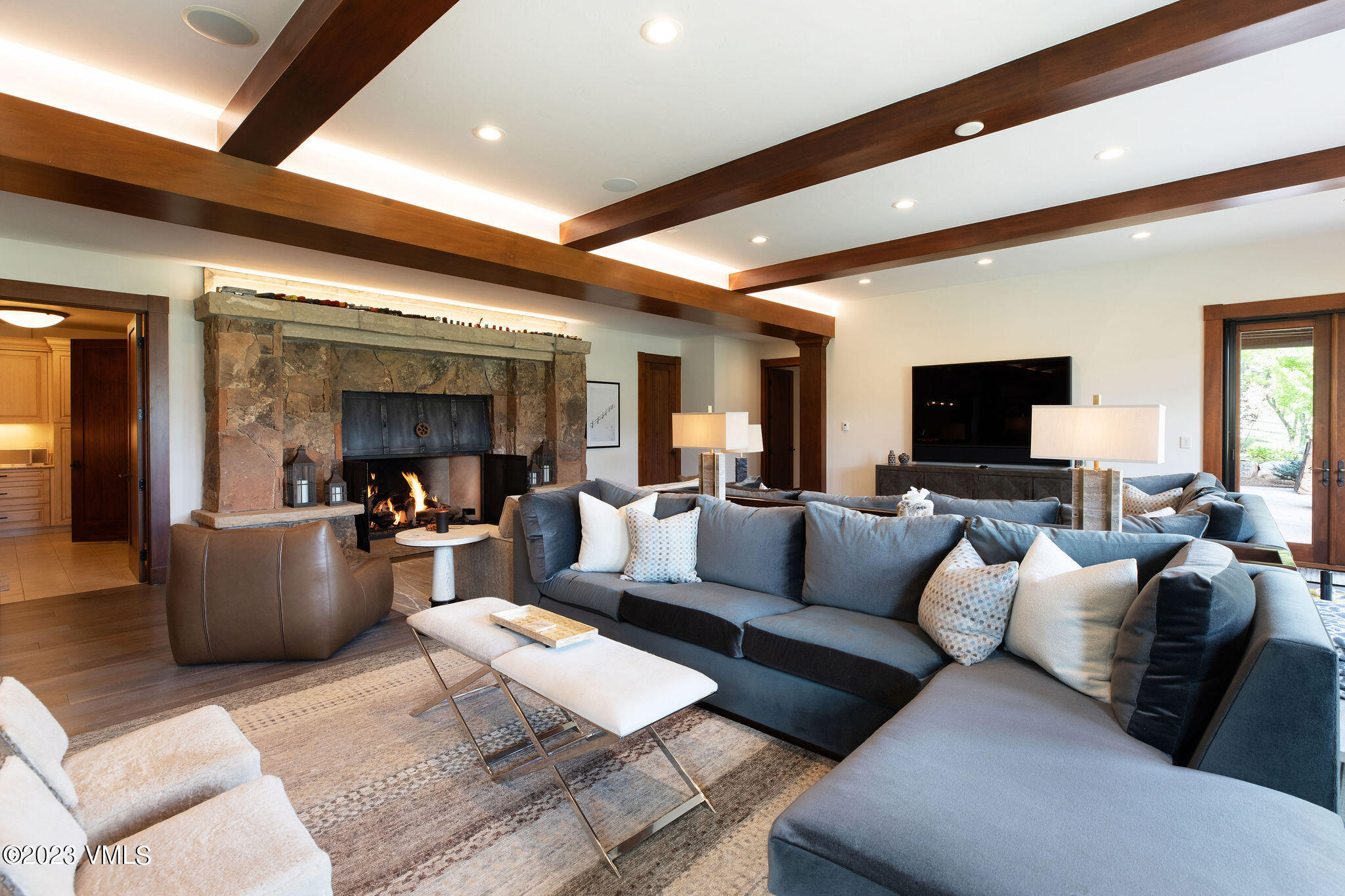 520 Old Creamery Road Edwards, CO 81632 - Photo 32 of 78 a living room with furniture and a flat screen tv