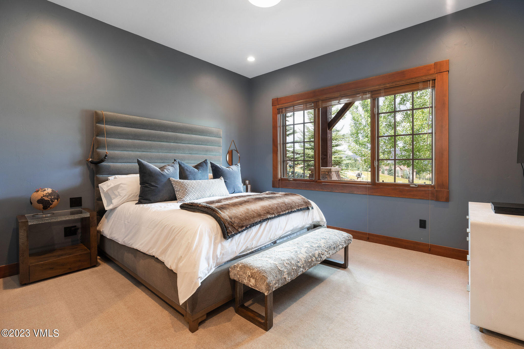 520 Old Creamery Road Edwards, CO 81632 - Photo 40 of 78 a spacious bedroom with a bed and a window