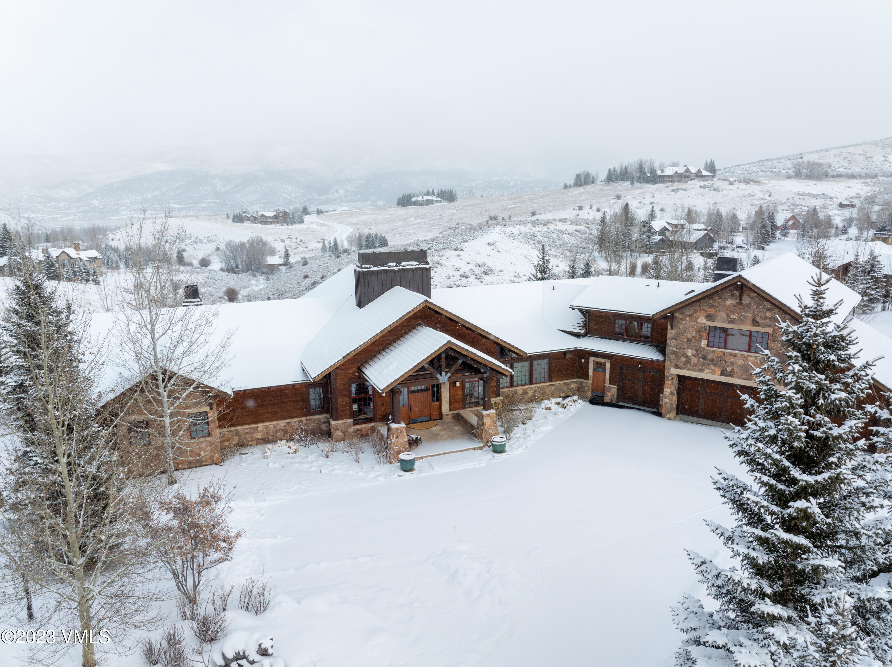 520 Old Creamery Road Edwards, CO 81632 - Photo 4 of 78 an aerial view of a house with a yard and sitting area