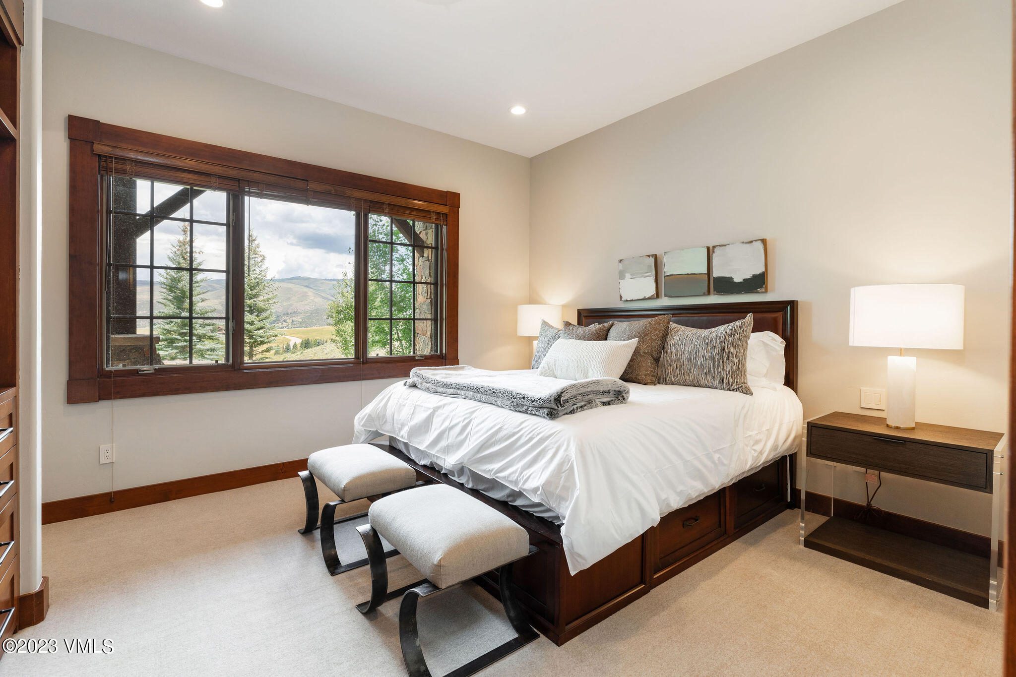 520 Old Creamery Road Edwards, CO 81632 - Photo 42 of 78 a bedroom with a bed and a window