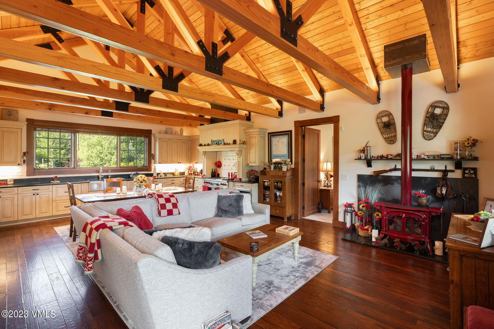 520 Old Creamery Road Edwards, CO 81632 - Photo 50 of 78 a living room with furniture and a large window