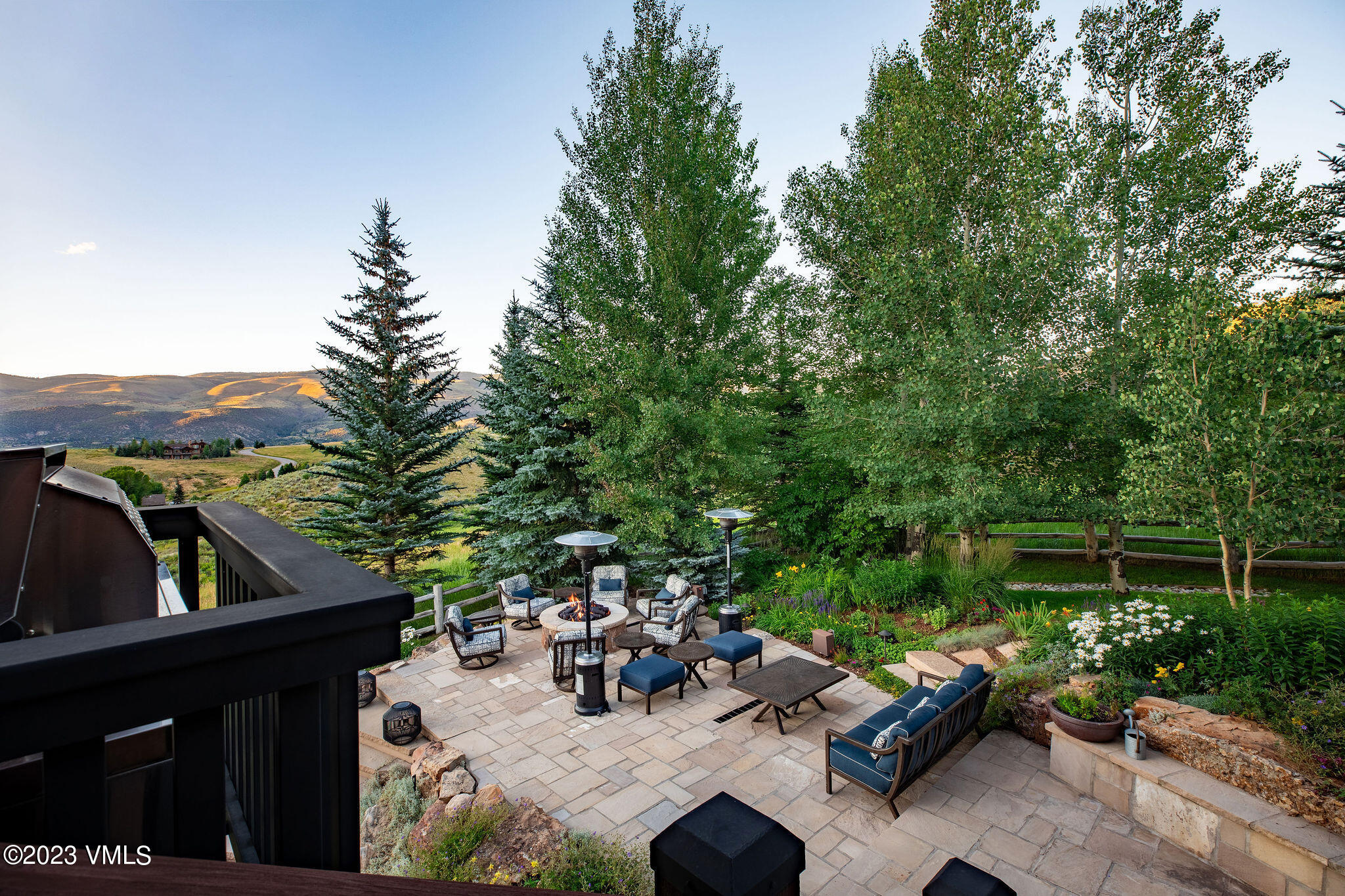 520 Old Creamery Road Edwards, CO 81632 - Photo 56 of 78 a view of a patio with couches table and chairs and potted plants