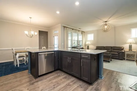 a kitchen with lots of counter space and a sink