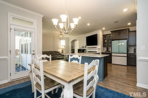 a spacious bedroom with a bed and a window