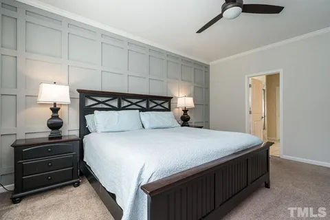 a bathroom with a double vanity sink mirror and toilet