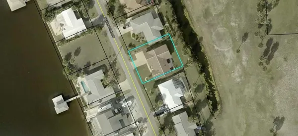 a view of a swimming pool and an outdoor seating