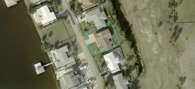 a view of a swimming pool and an outdoor seating