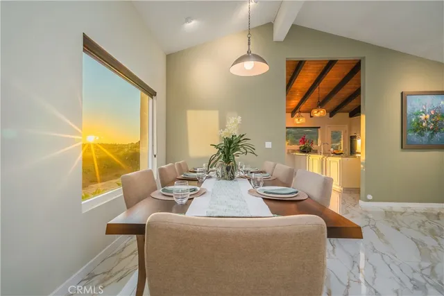 a living room with furniture and a piano