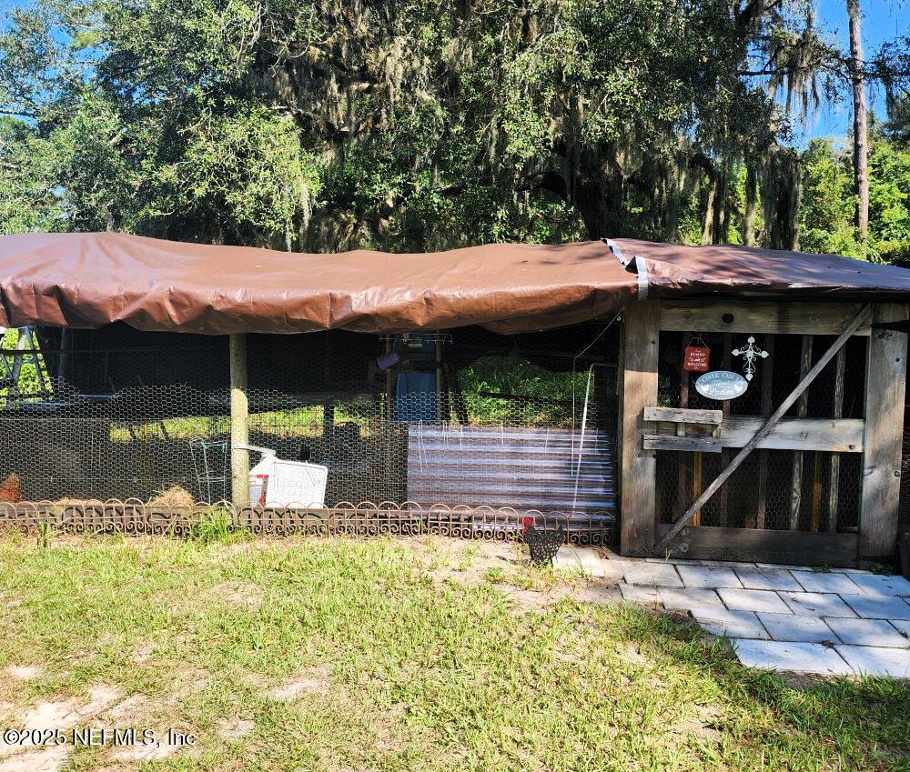 7140 Pinon Road Keystone Heights, FL 32656 - Photo 30 of 50 animal coop/garden