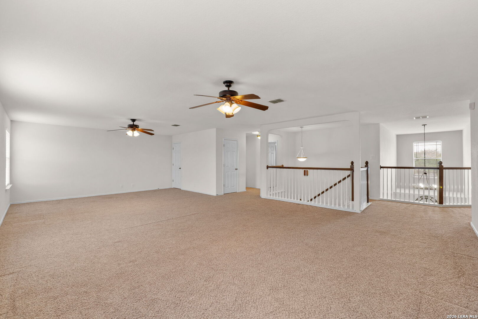 9727 Krier Court Converse, TX 78109 - Photo 15 of 31 a view of a livingroom with a ceiling fan and window