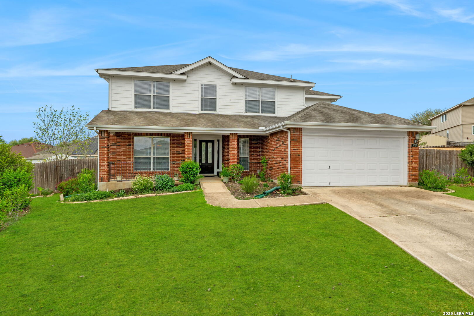 9727 Krier Court Converse, TX 78109 - Photo 23 of 31 a front view of a house with a yard and garage