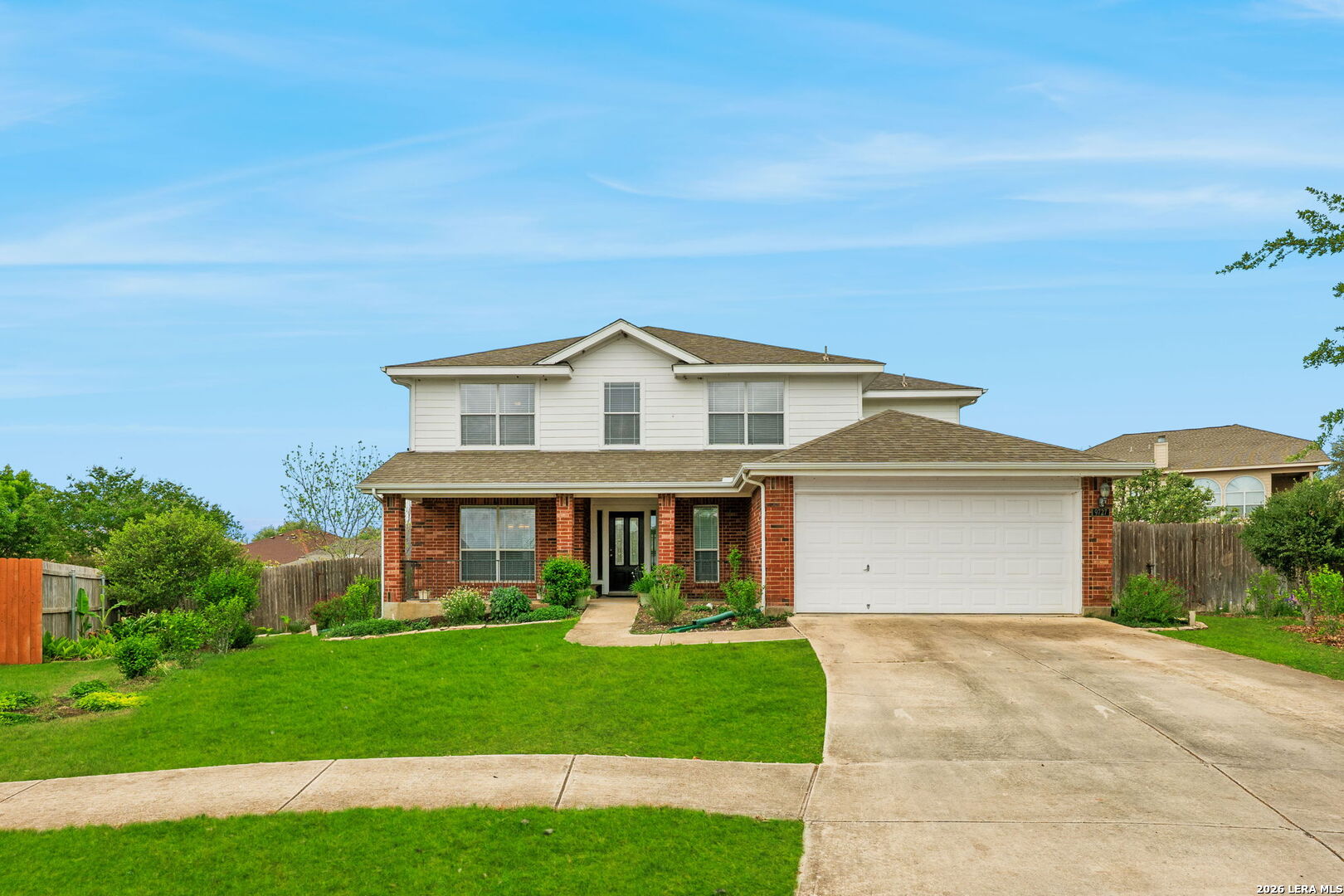 9727 Krier Court Converse, TX 78109 - Photo 24 of 31 a front view of a house with a yard and garage