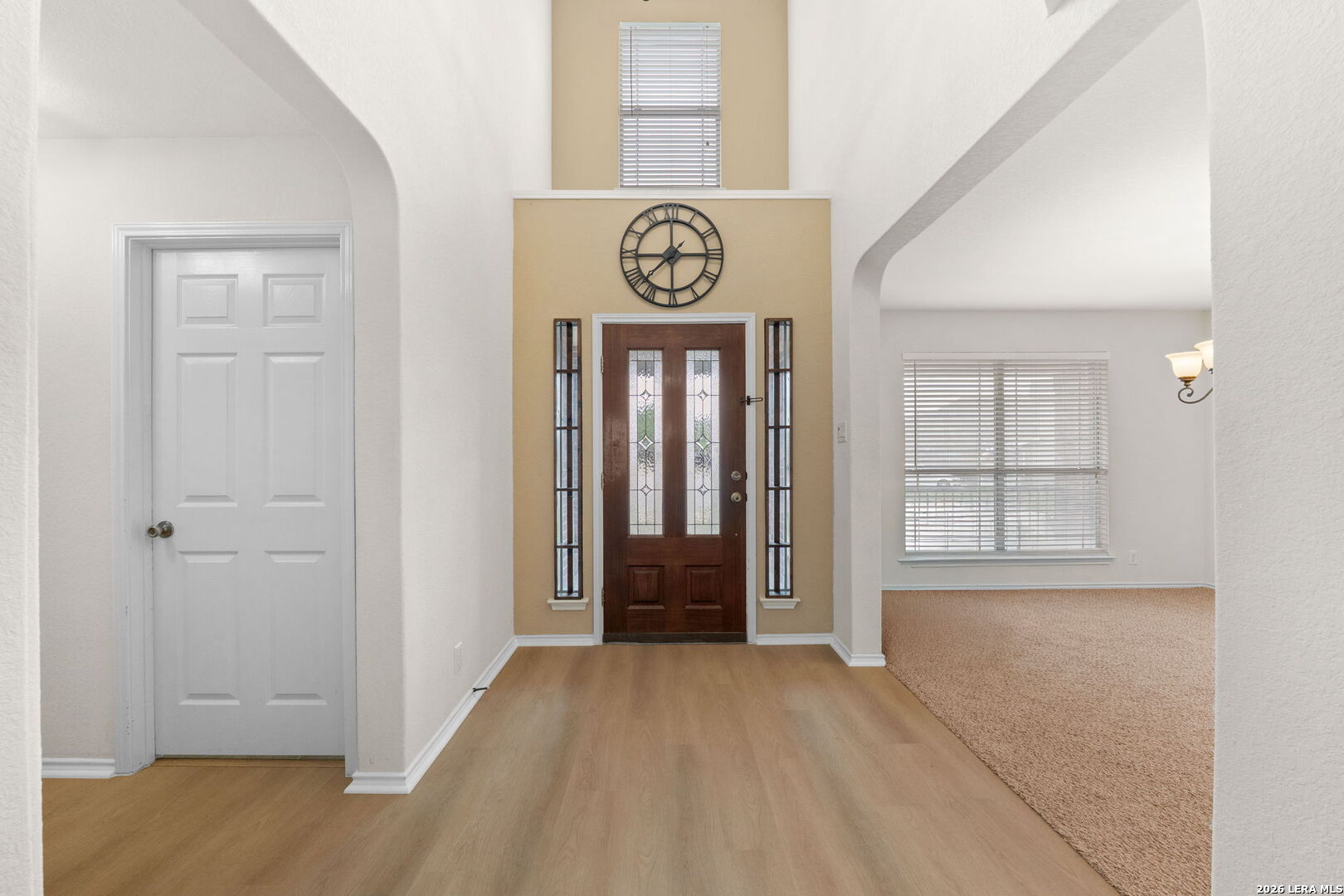 9727 Krier Court Converse, TX 78109 - Photo 4 of 31 a view of an entryway with wooden floor