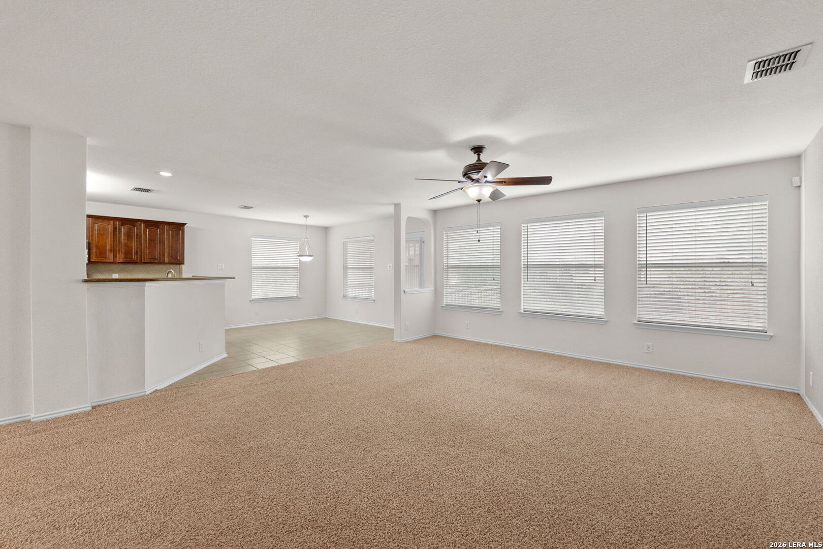 9727 Krier Court Converse, TX 78109 - Photo 9 of 31 a view of an empty room with a window