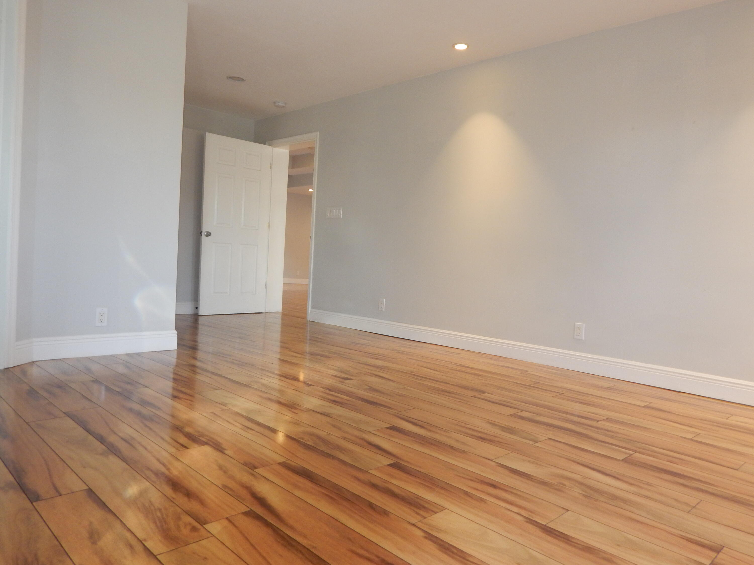 298 Northwest 11th Street Boca Raton, FL 33432 - Photo 6 of 19 a view of empty room with wooden floor