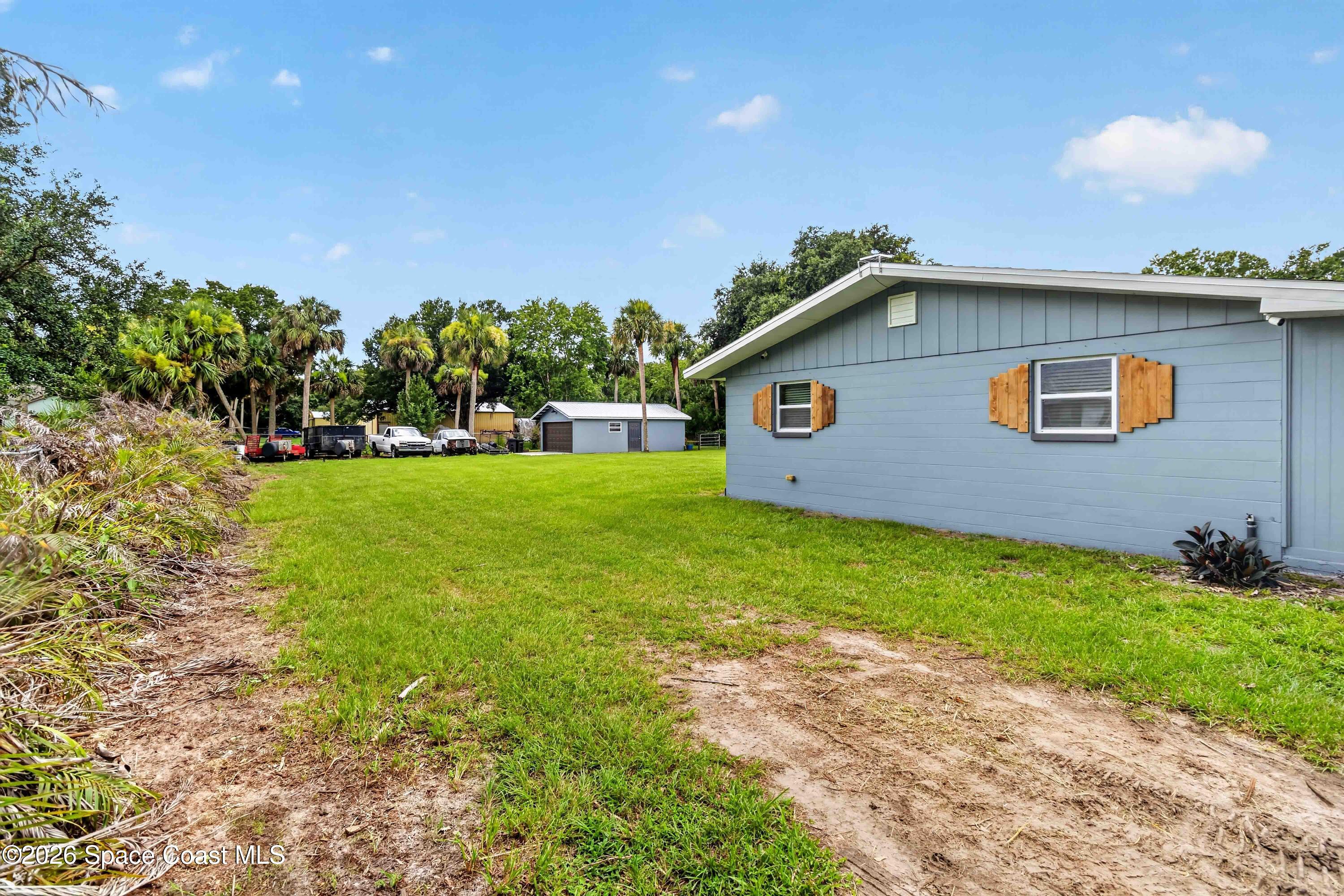 4105 Rector Road Cocoa, FL 32926 - Photo 33 of 49 Left Side of Home