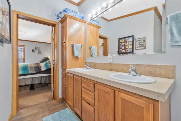 a bathroom with a sink and a mirror