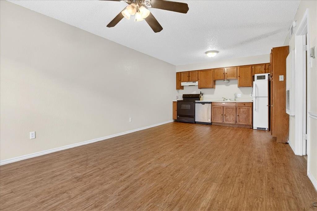 1326 South 11th Street, Unit 2 Waco, TX 76706 - Photo 3 of 11 a view of a kitchen with a sink and cabinets