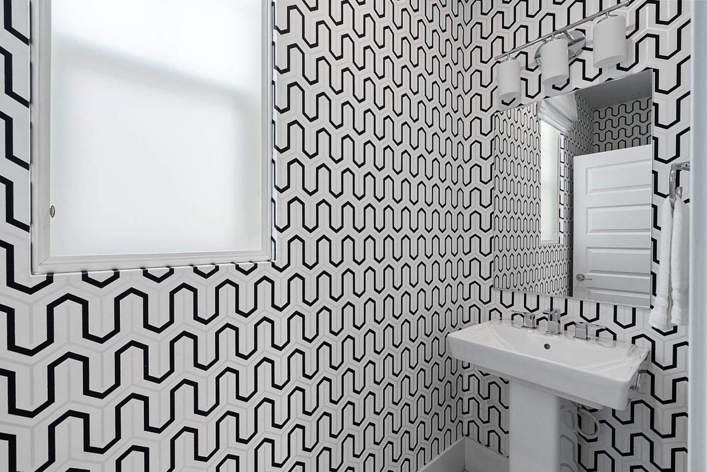 398 Circuit Way Mountain View, CA 94043 - Photo 17 of 29 a bathroom with a sink and a mirror