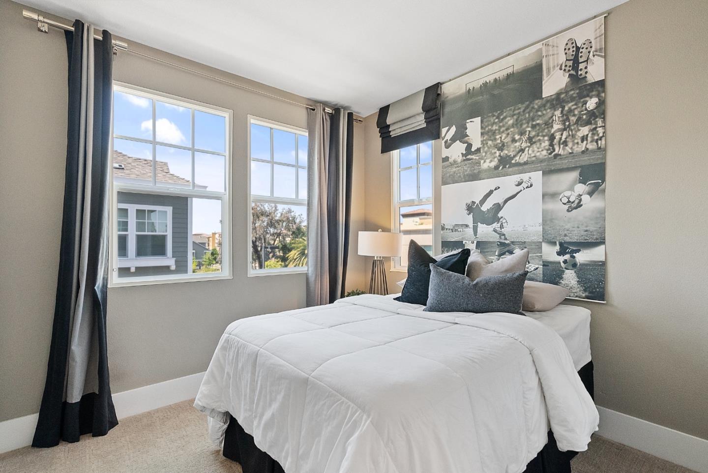 398 Circuit Way Mountain View, CA 94043 - Photo 22 of 29 a bedroom with a large bed and a window