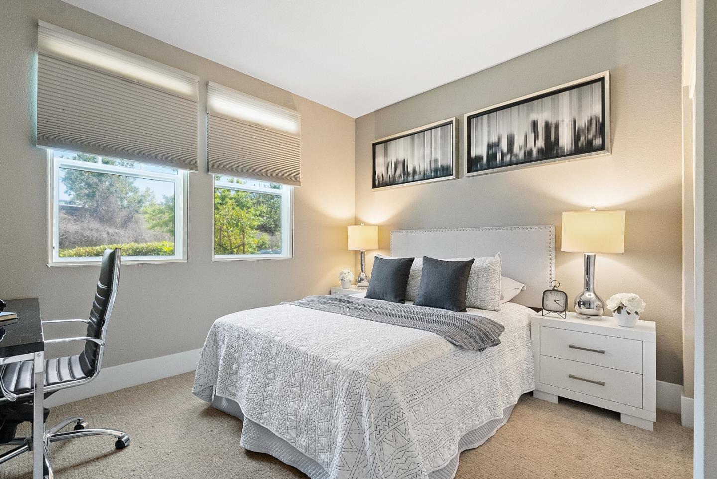 398 Circuit Way Mountain View, CA 94043 - Photo 3 of 29 a bedroom with a large bed and a window