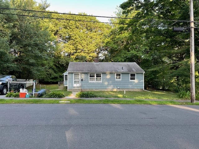 28 Martin Road Reading, MA 01867 - Photo 14 of 19 a view of house with outdoor space and street view