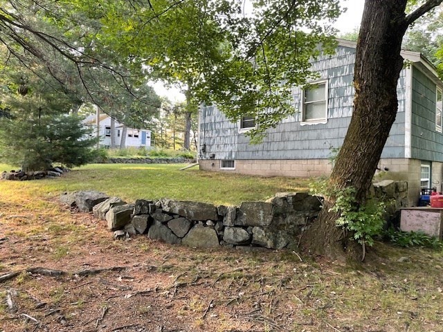 28 Martin Road Reading, MA 01867 - Photo 17 of 19 a view of a garden with an outdoor space