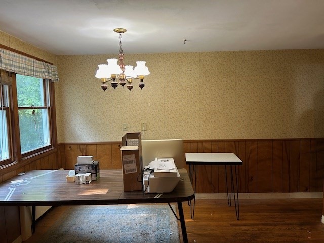 28 Martin Road Reading, MA 01867 - Photo 5 of 19 a view of a workspace with furniture and wooden floor