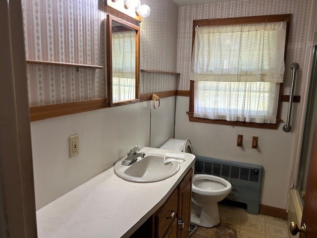 28 Martin Road Reading, MA 01867 - Photo 8 of 19 a bathroom with a sink toilet and mirror