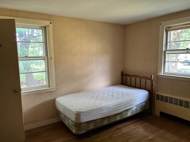 28 Martin Road Reading, MA 01867 - Photo 9 of 19 a bedroom with a bed window and a window