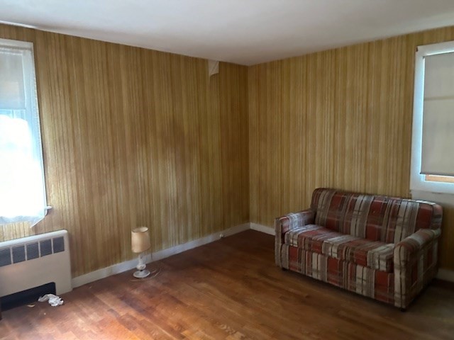 28 Martin Road Reading, MA 01867 - Photo 10 of 19 a living room with furniture and a curtain