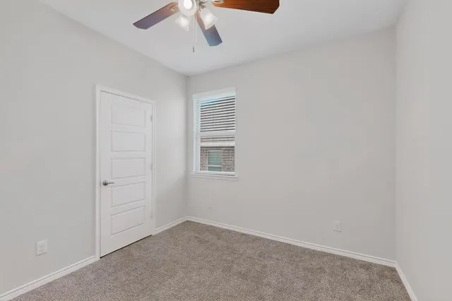 a house with trees in the background