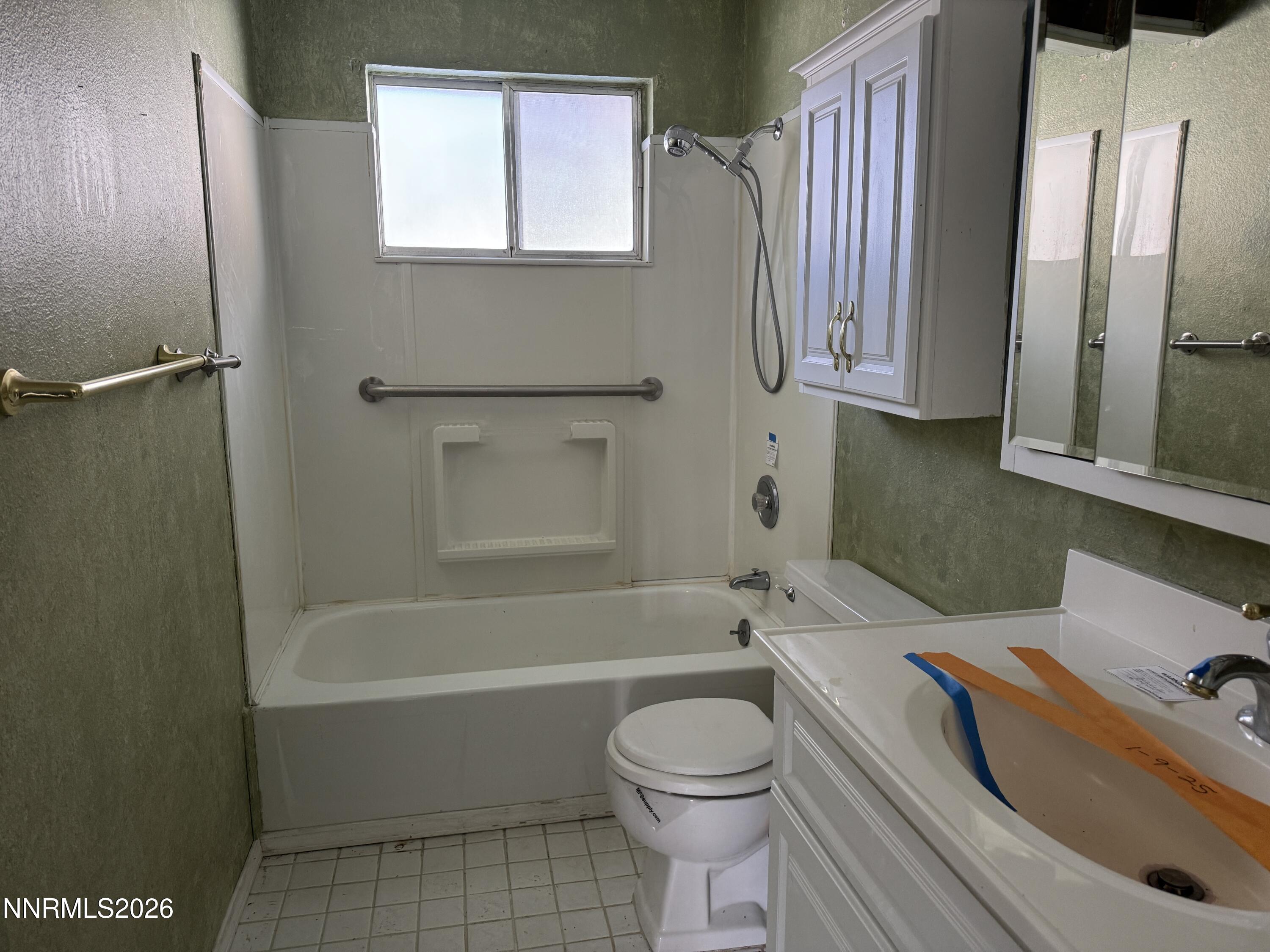 302 Griffin Court Stateline, NV 89449 - Photo 6 of 10 a bathroom with a sink toilet and shower