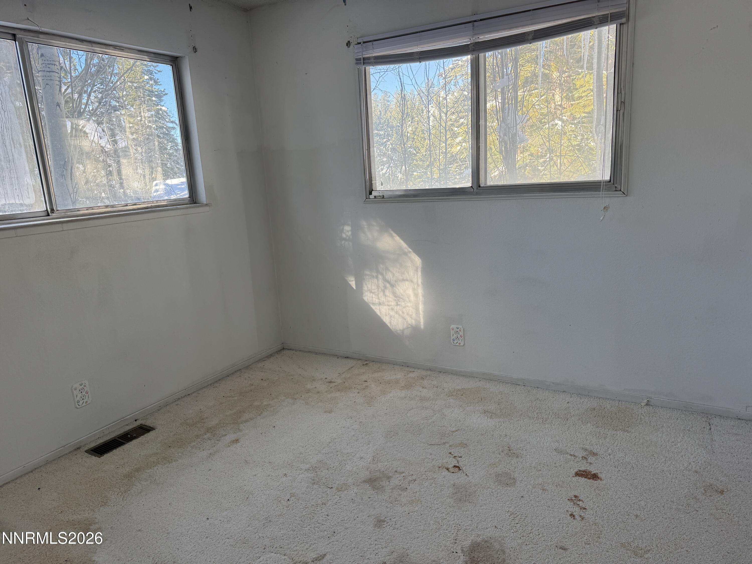 302 Griffin Court Stateline, NV 89449 - Photo 7 of 10 an empty room with windows