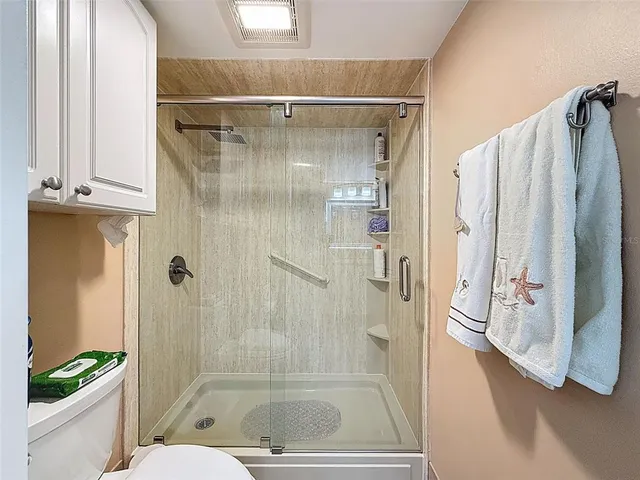 a view of swimming pool with outdoor seating and yard