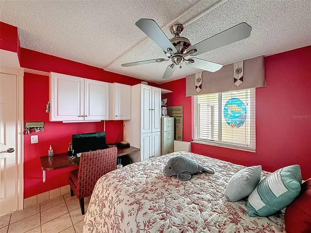 a room with wooden floor and window