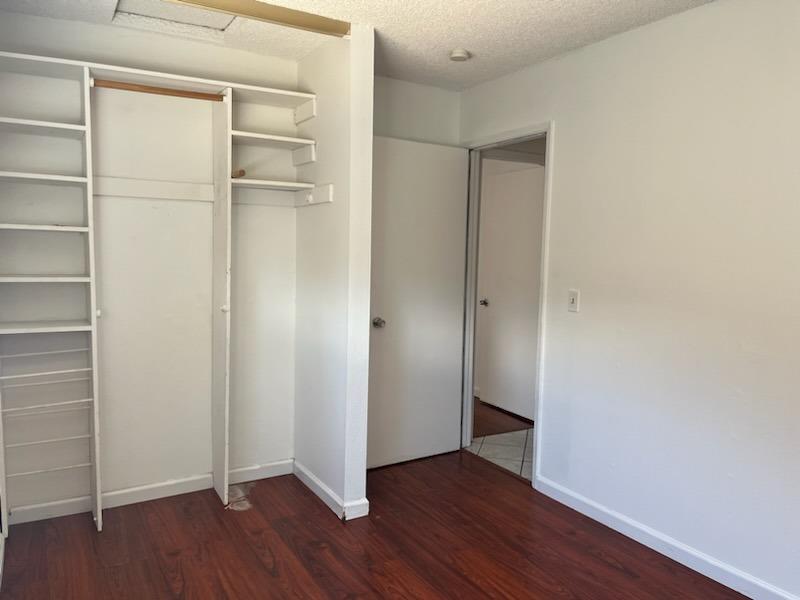 3065 Anderson Avenue Clovis, CA 93612 - Photo 14 of 16 a view of an empty room with wooden floor