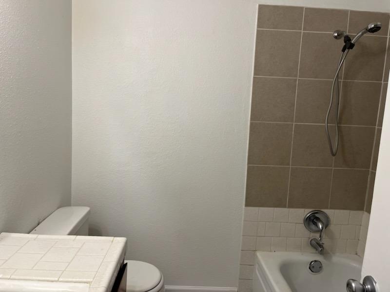 3065 Anderson Avenue Clovis, CA 93612 - Photo 10 of 16 a bathroom with a sink and a toilet