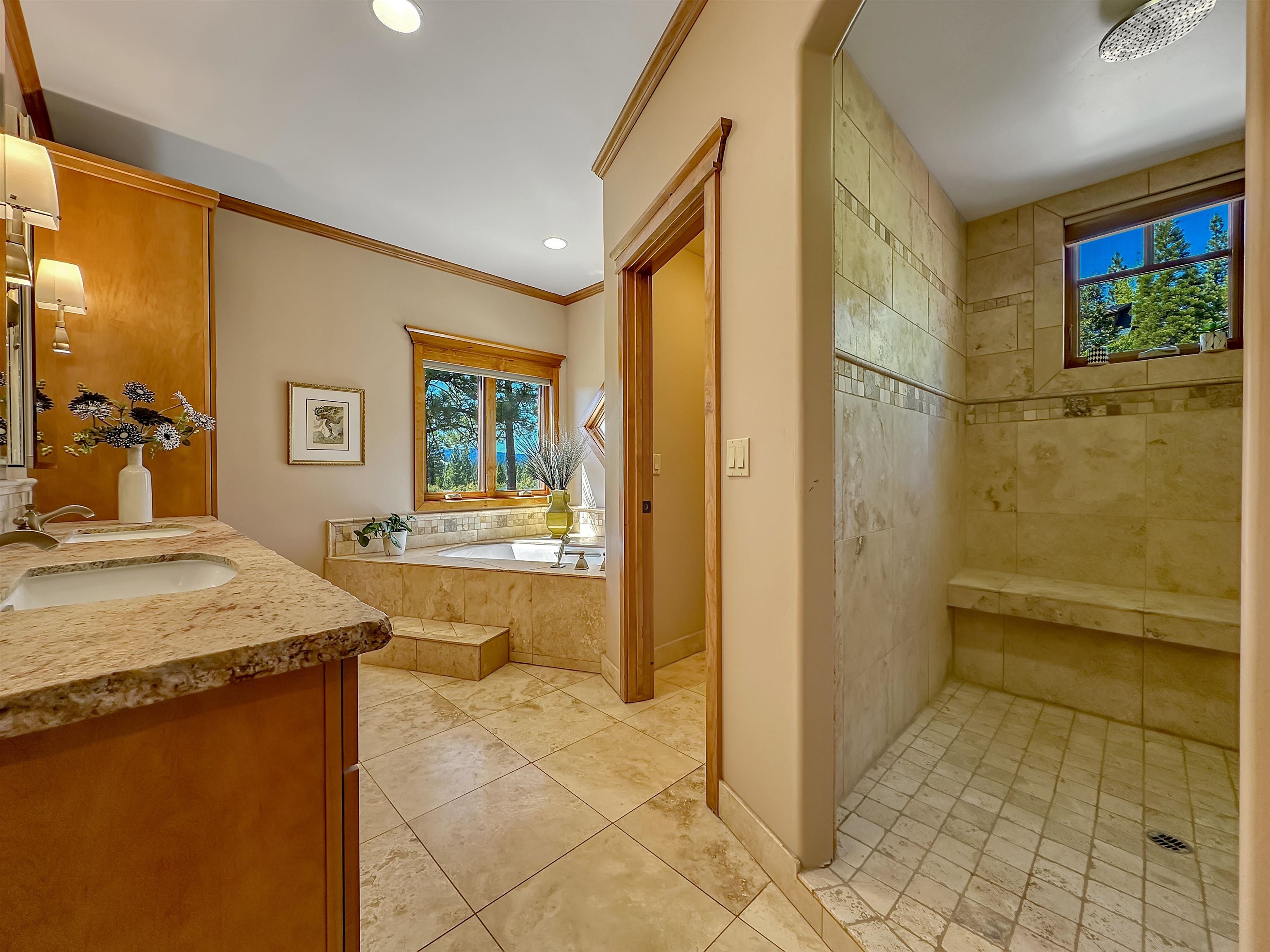 1947 Grizzly Ranch Road Portola, CA 96122 - Photo 13 of 25 a bathroom with a granite countertop sink a mirror and a bathtub