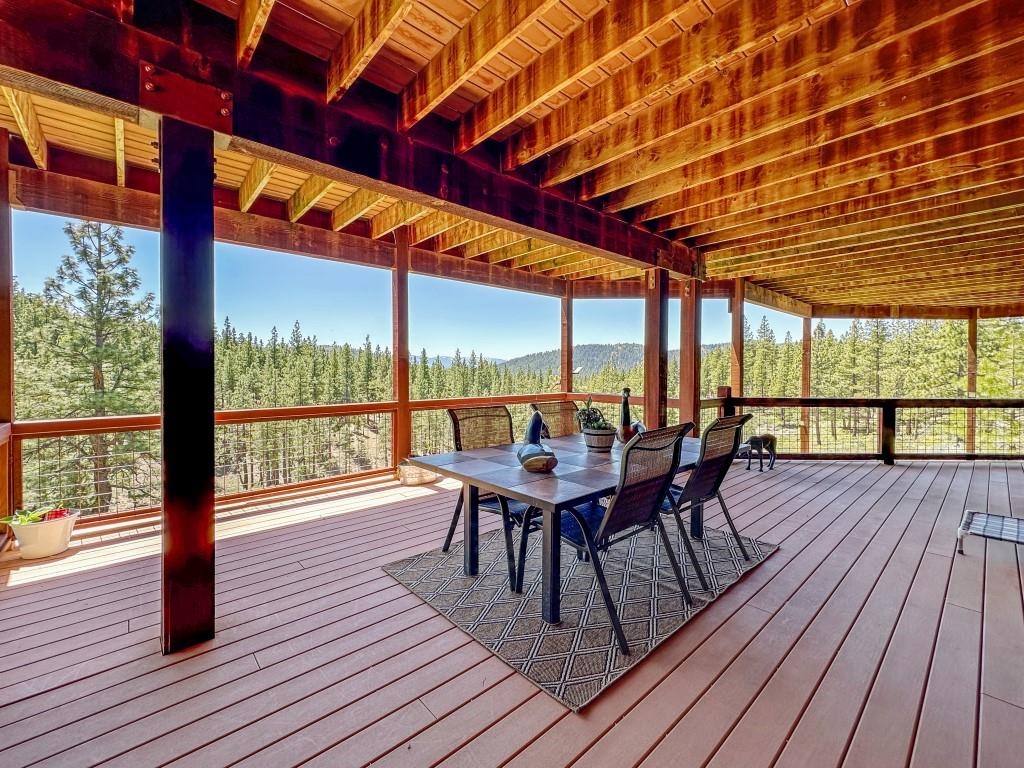 1947 Grizzly Ranch Road Portola, CA 96122 - Photo 24 of 25 a dining room with furniture and wooden floor
